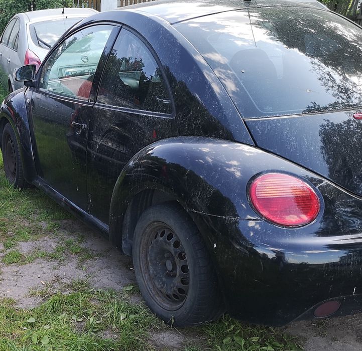 VW New Beetle części od a-z mocowanie okular lampy prawy przód  orygin