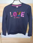 bluza z cekinami rozm 134
