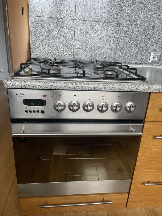 Kuchnia gazowa z piekarnikiem elekyrycznym Amica Mode GH0600, uzywana,