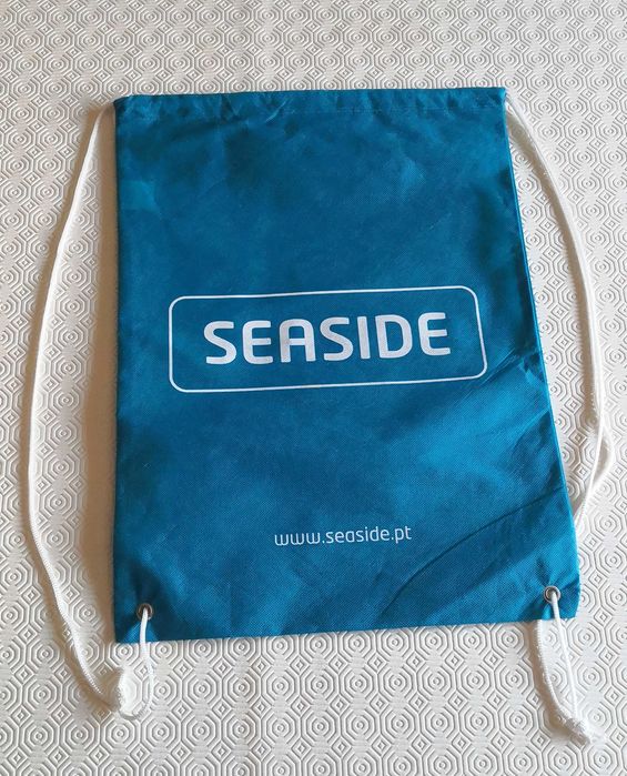 8 mochilas tecido não-tecido