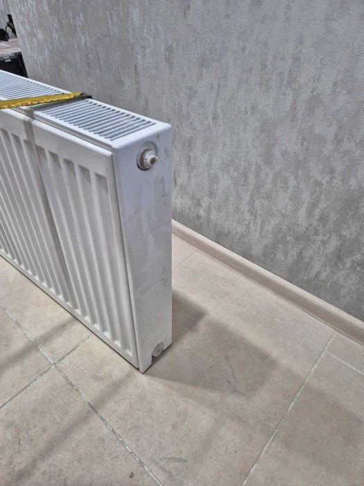 Продам металлический радиатор 70см в использовании НЕБЫЛ