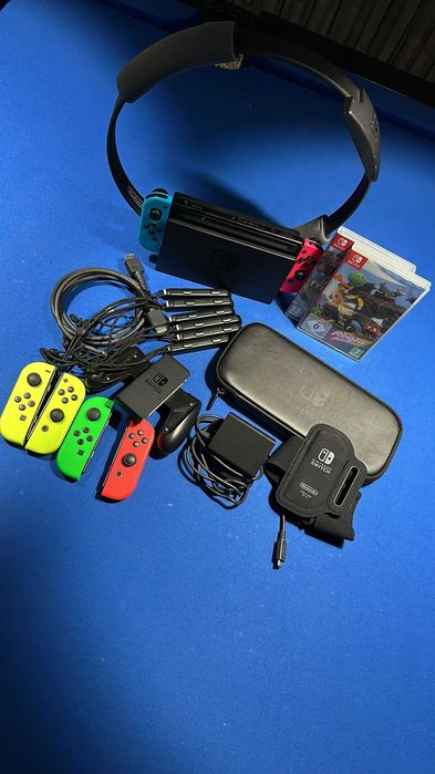 Vendo Nintendo Switch V1+Extras tudo completo em caixa.