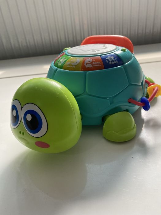 Розвіваюча, музична черепашка телефон. Має багато функцій.