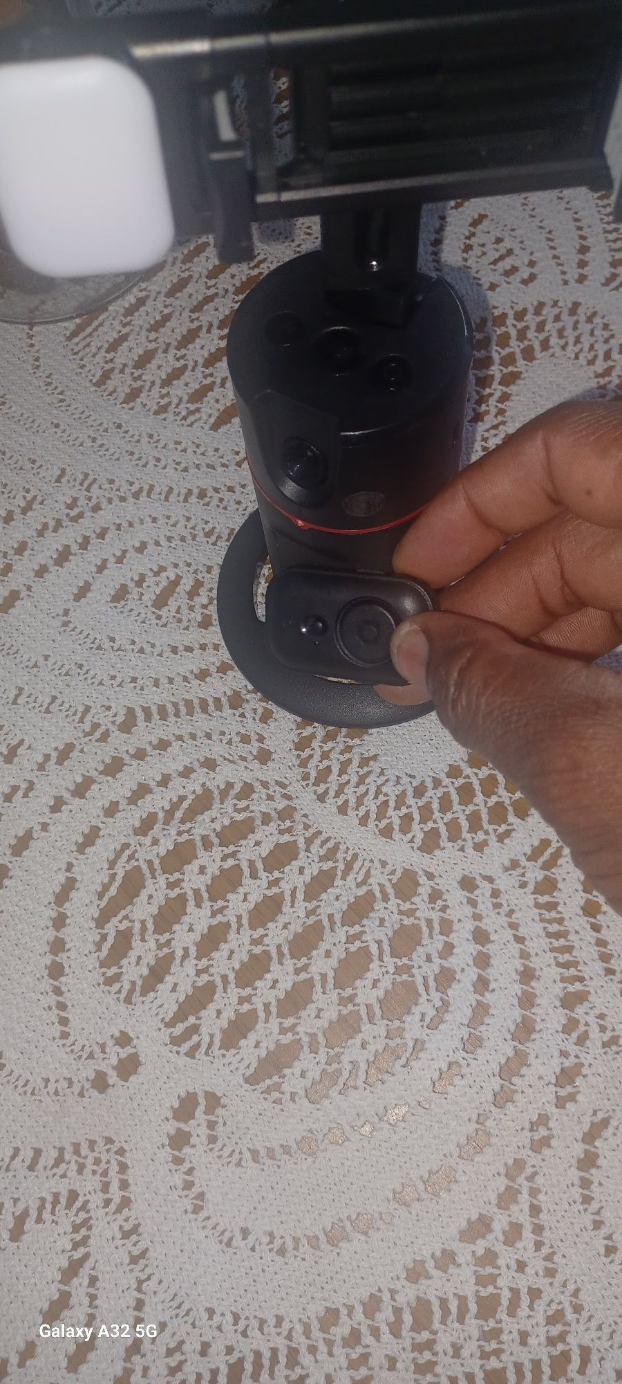 Suporte de telemóvel com restreamento automática de rosto