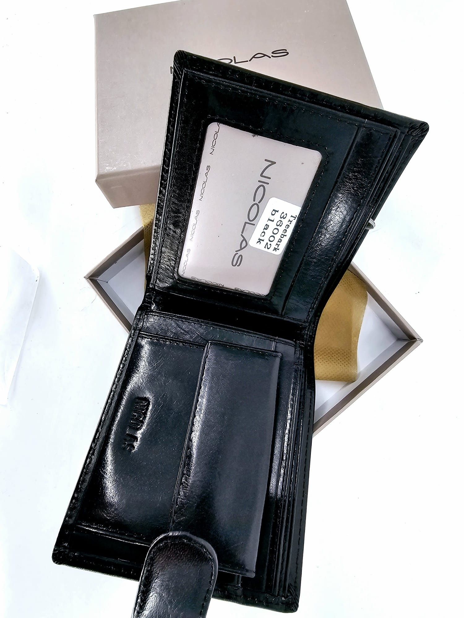 Nicolas czarny męski portfel skórzany nowy lakierowany