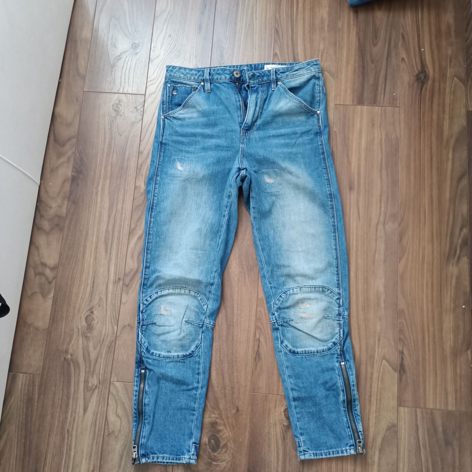 Spodnie damskie jeansy z zamkami na nogawkach