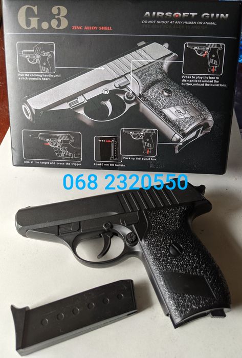 Металевий пістолет на пульках іграшкова зброя