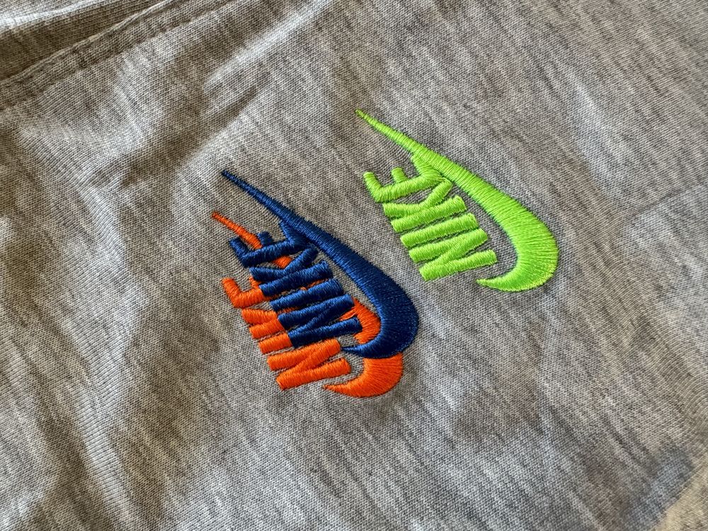 Шорти Nike багато лого