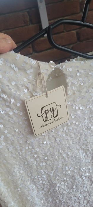 Sukienka kremowa cekinowa