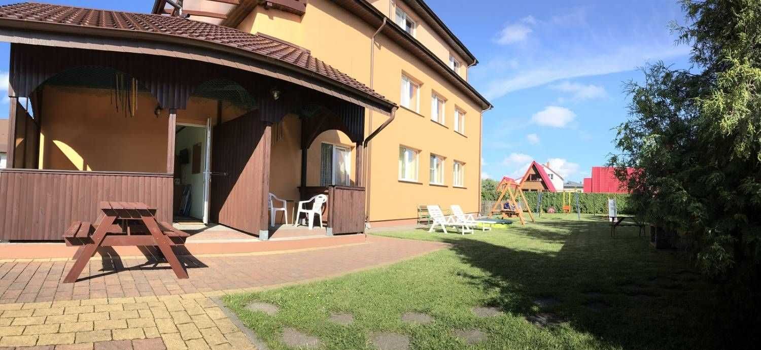 Pokoje Gościnne Pelikan Dąbki - morze, jezioro, parking