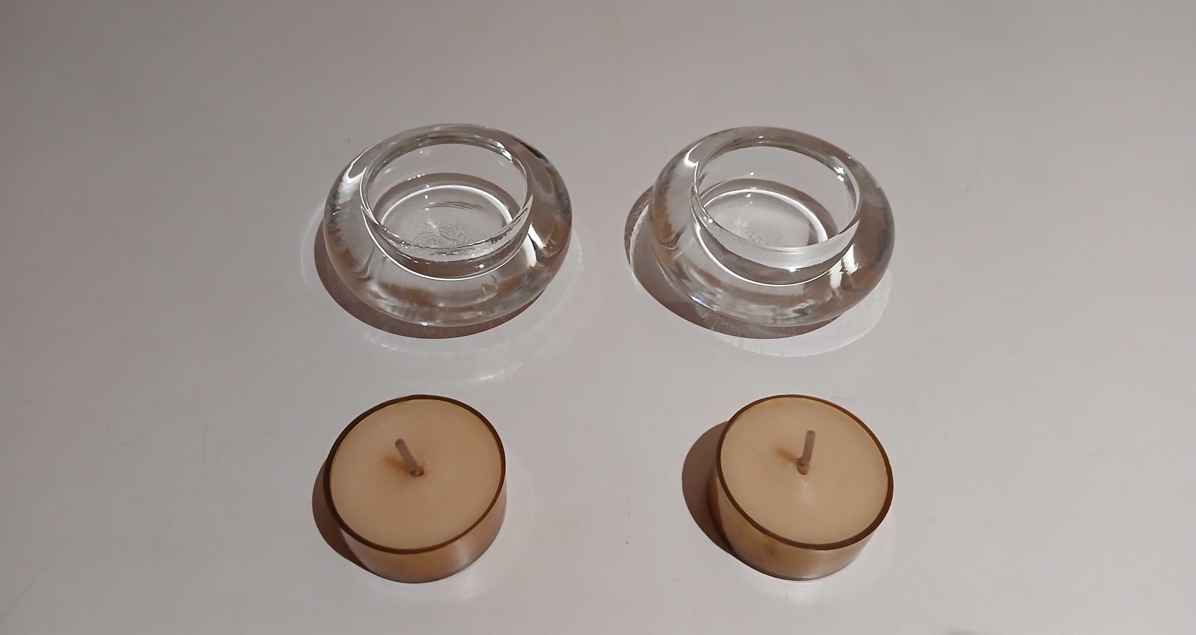 Dois castiçais transparentes novos com velas perfumadas