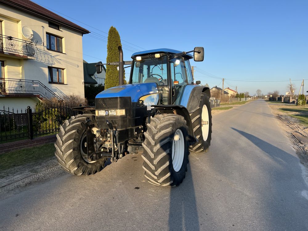 New Holland TM 190 miekka oś i kabina sprowadzony