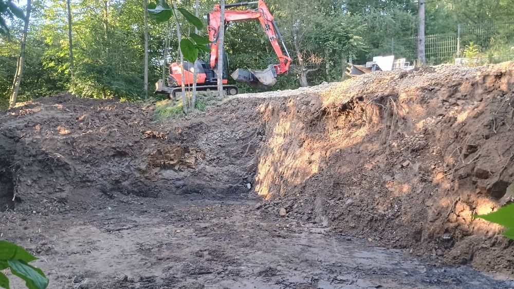 Koparka montaż zbiorników odwodnienia roboty ziemne transport krakow