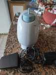 Maquina de costura de Viagem