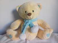 Urso de peluche com cachecol