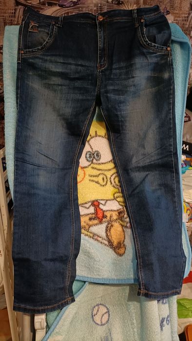 Продам мужские стрейчевые   джинсовые брюки .