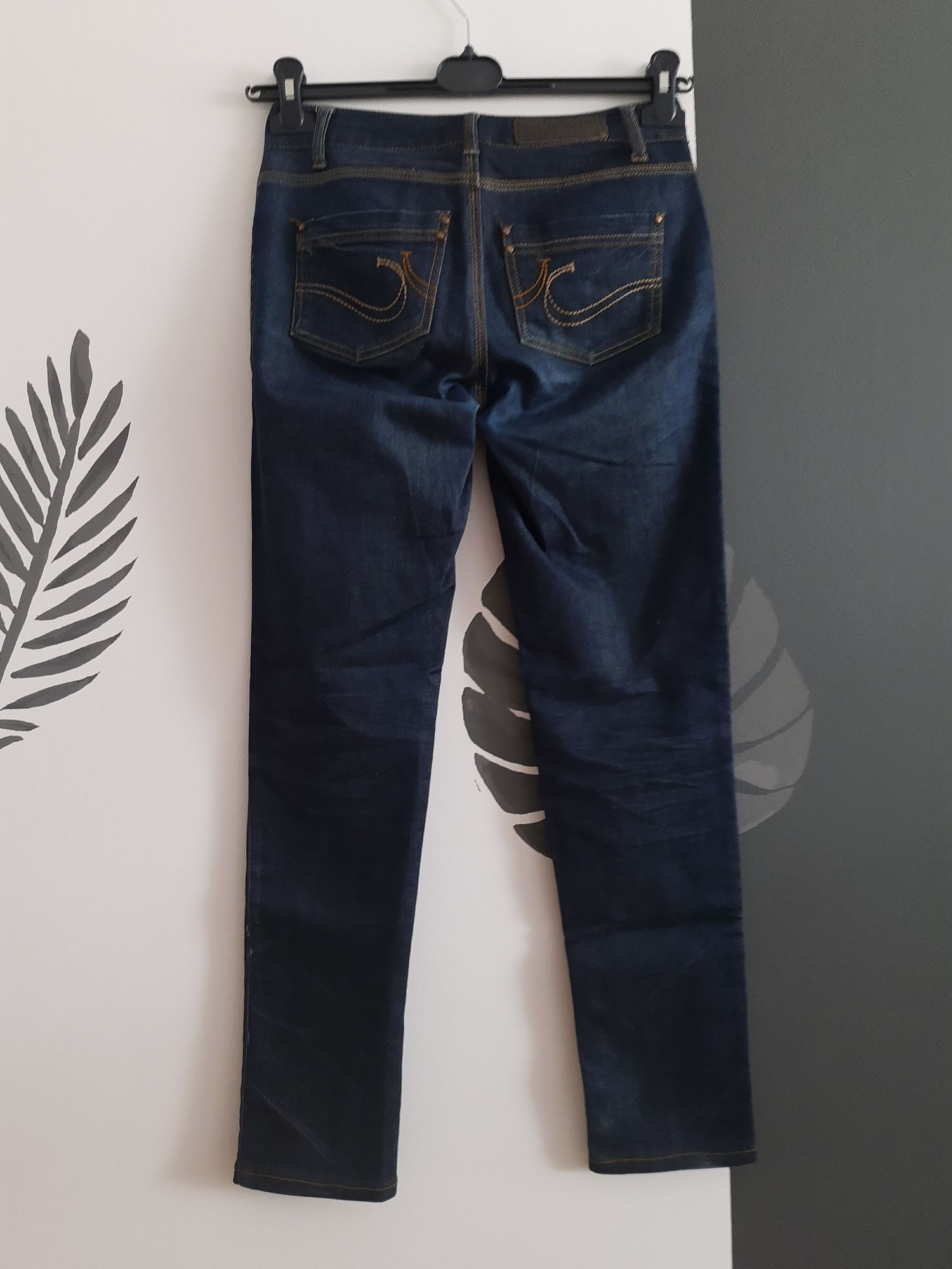 Spodnie jeans 34