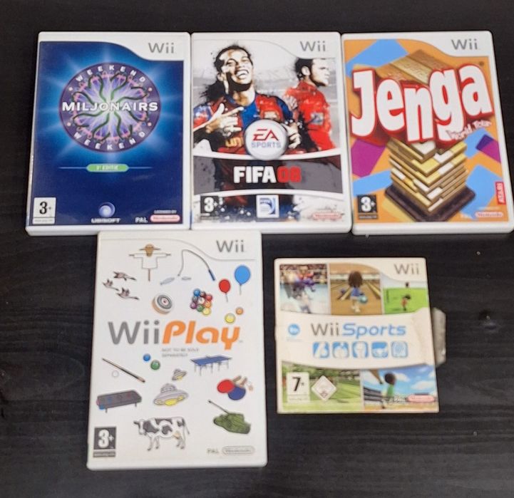 Vendo consola Nintendo Wii com vários jogos.