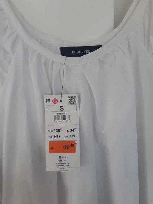 Biała sukienka reserved