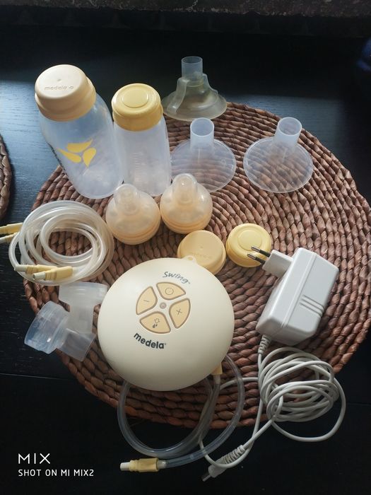 Medela Swing elektryczny + ręczny, 2 Calma smoczki