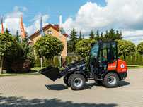 Kubota RT260-2  Ładowarka Kołowa z Kabiną Kubota 4 Cylindry Łyżka w zestawie 2605 kg