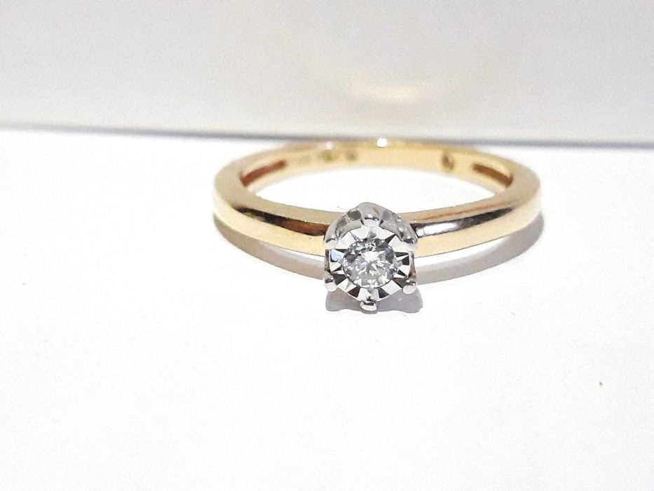 Złoty pierścionek zaręczynowy 585 diament 0.09ct., r.14