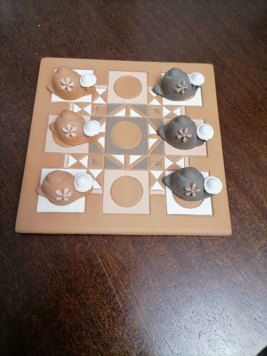 Jogo do galo em barro