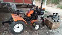 Mini trator cultivador