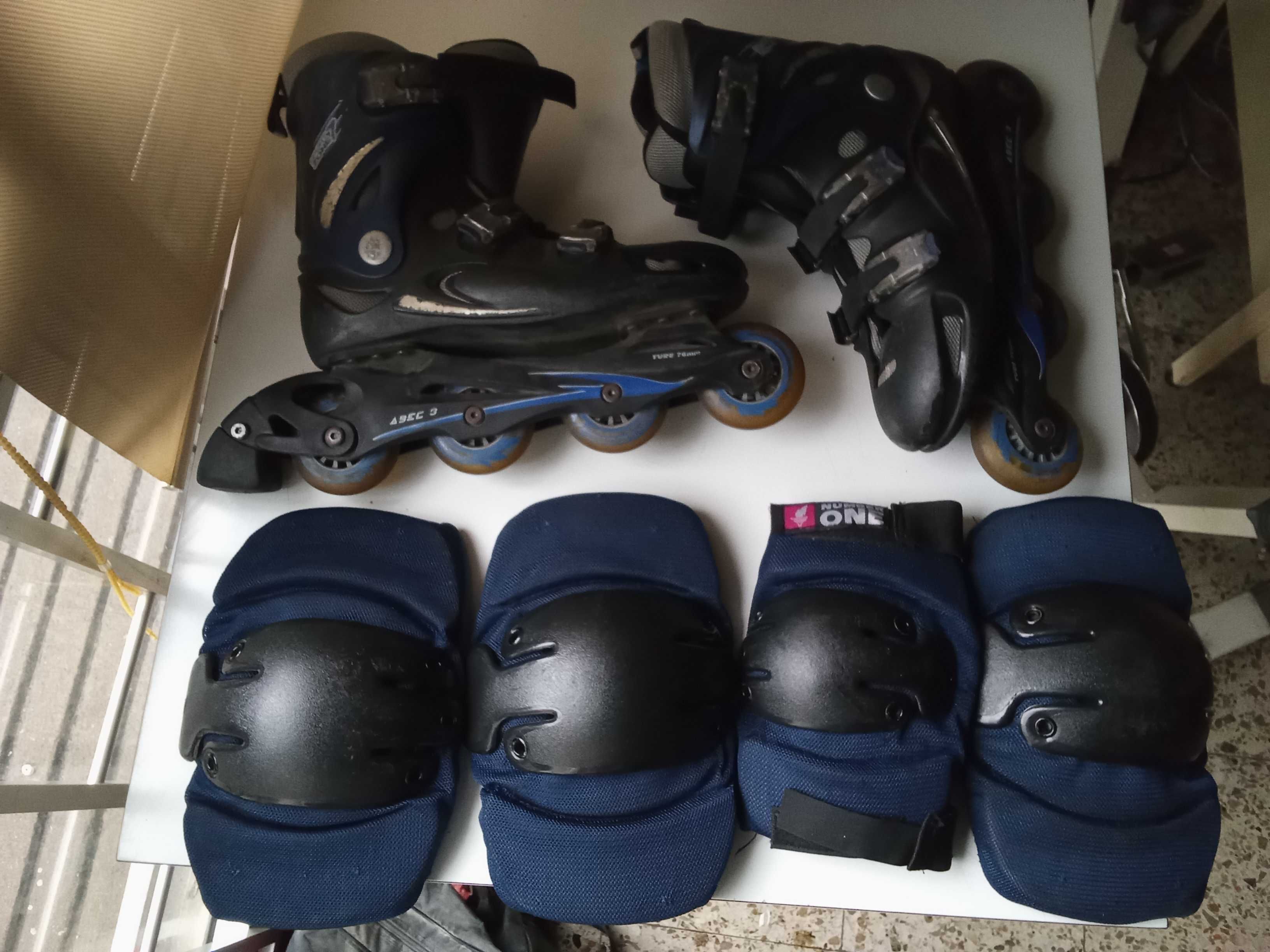 Patins em tinha № 43 ,com joelheires e coteveleires .