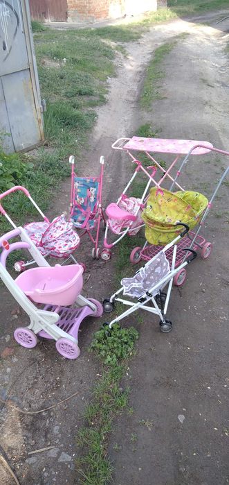 Детская игрушечная коляска