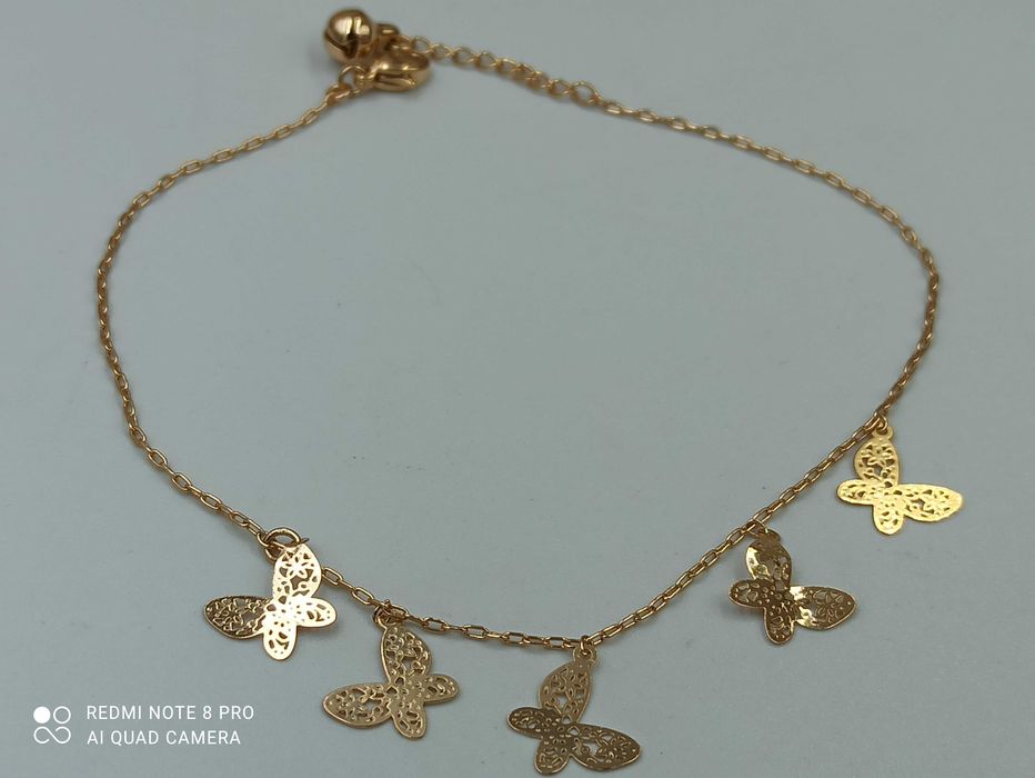 Bransoletka pozłacana 18k złotem na kostkę motylki