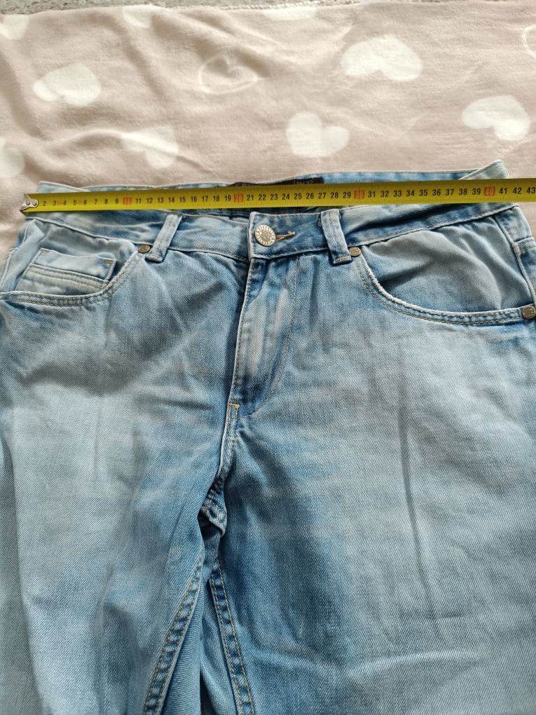 Męskie spodnie jeansowe Reserved W32 L34