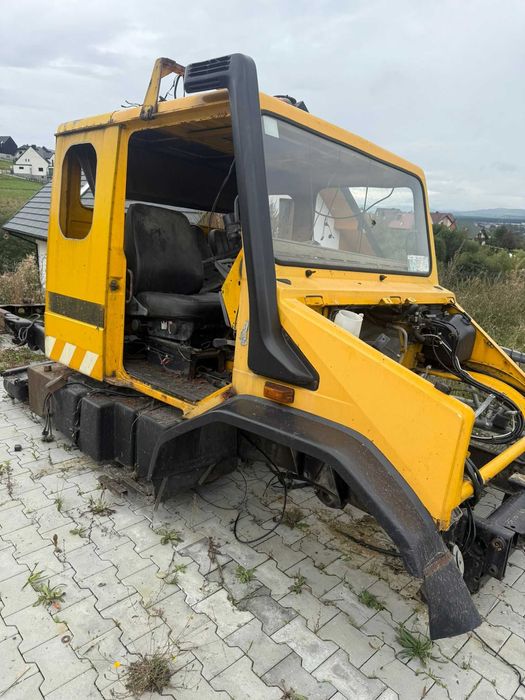 Atrapa maska przód kabina błotnik Mercedes Unimog U90 U110 U130 U140
