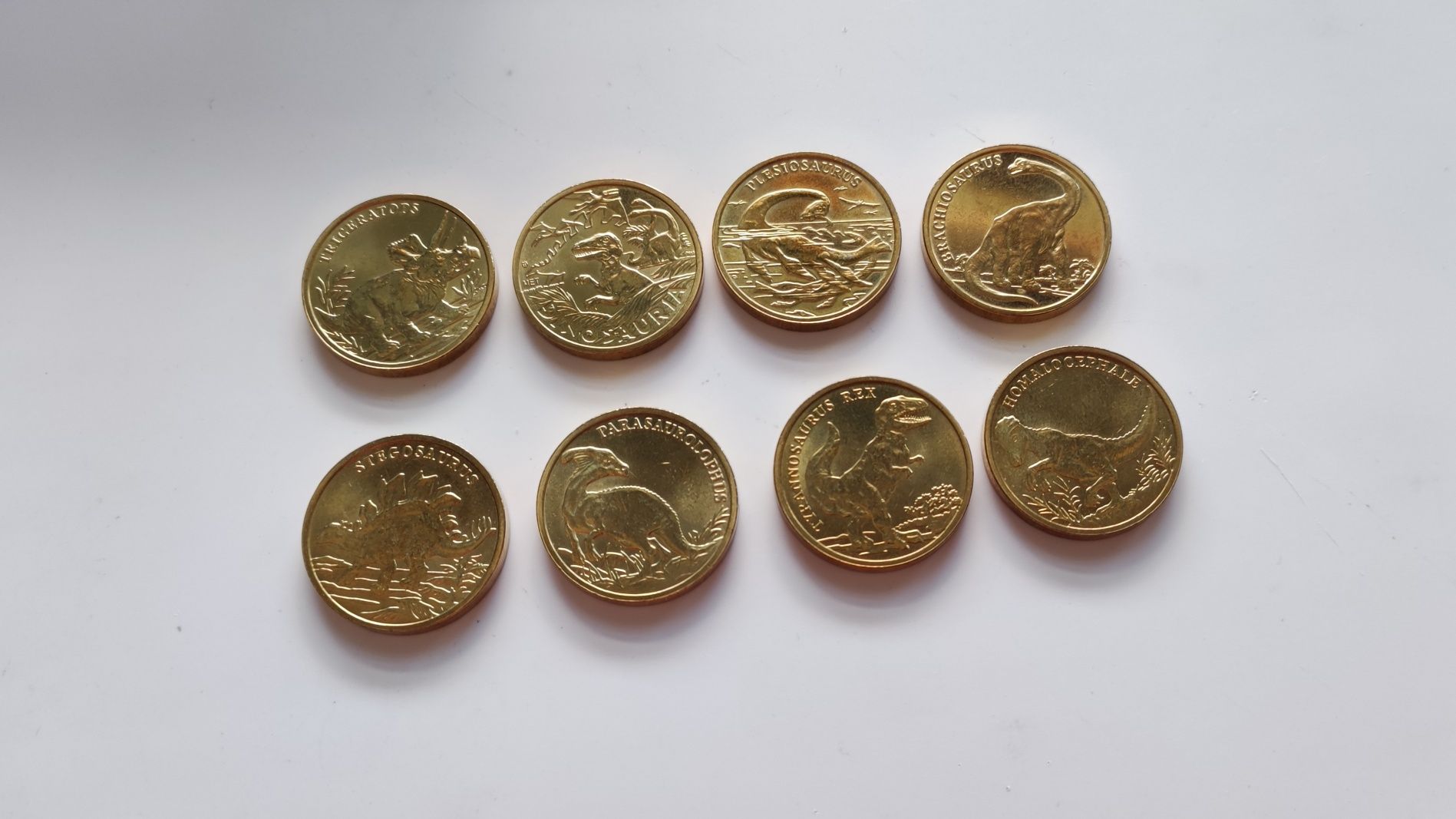Kolekcja 8 monet numizmatów Dinozaury. Wysyłka OLX.