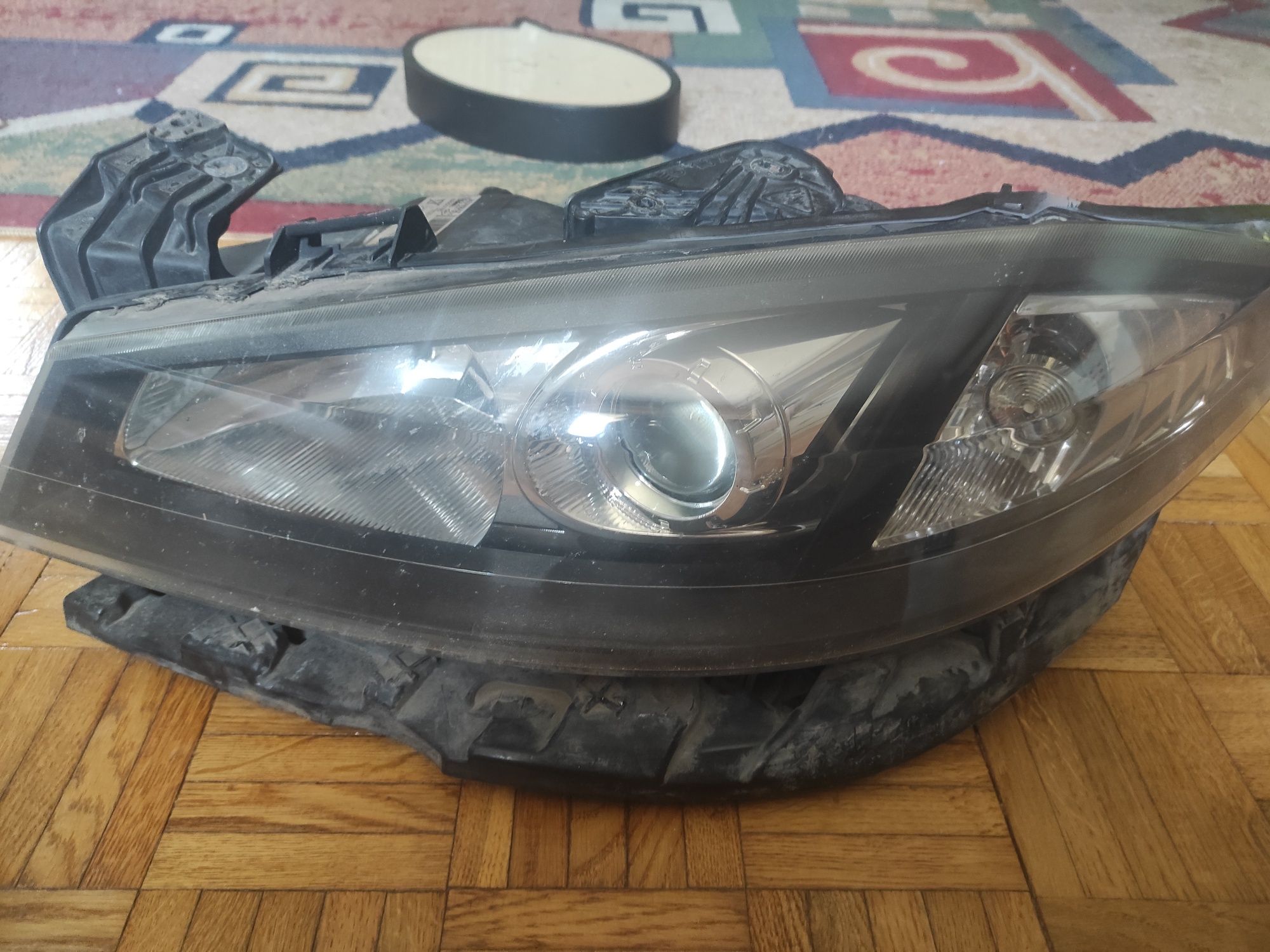Reflektor Xenon lewy laguna 2 FL 2006