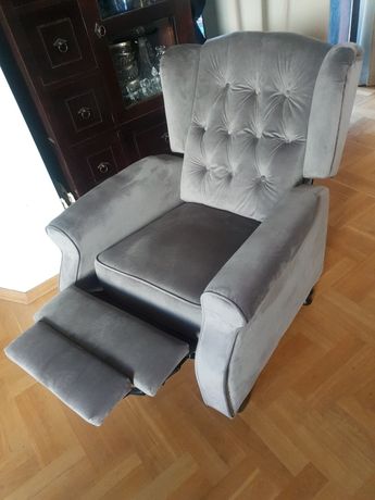 Nowy fotel uszak z wysuwanym podnóżkiem szary welur pikowany