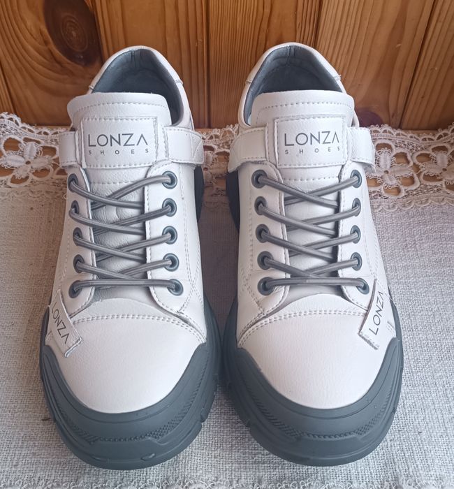 Продам шкіряні кросівки