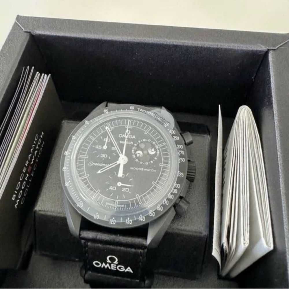 Ekskluzywne SO33B700 - Snoopy x Omega x Swatch Collab