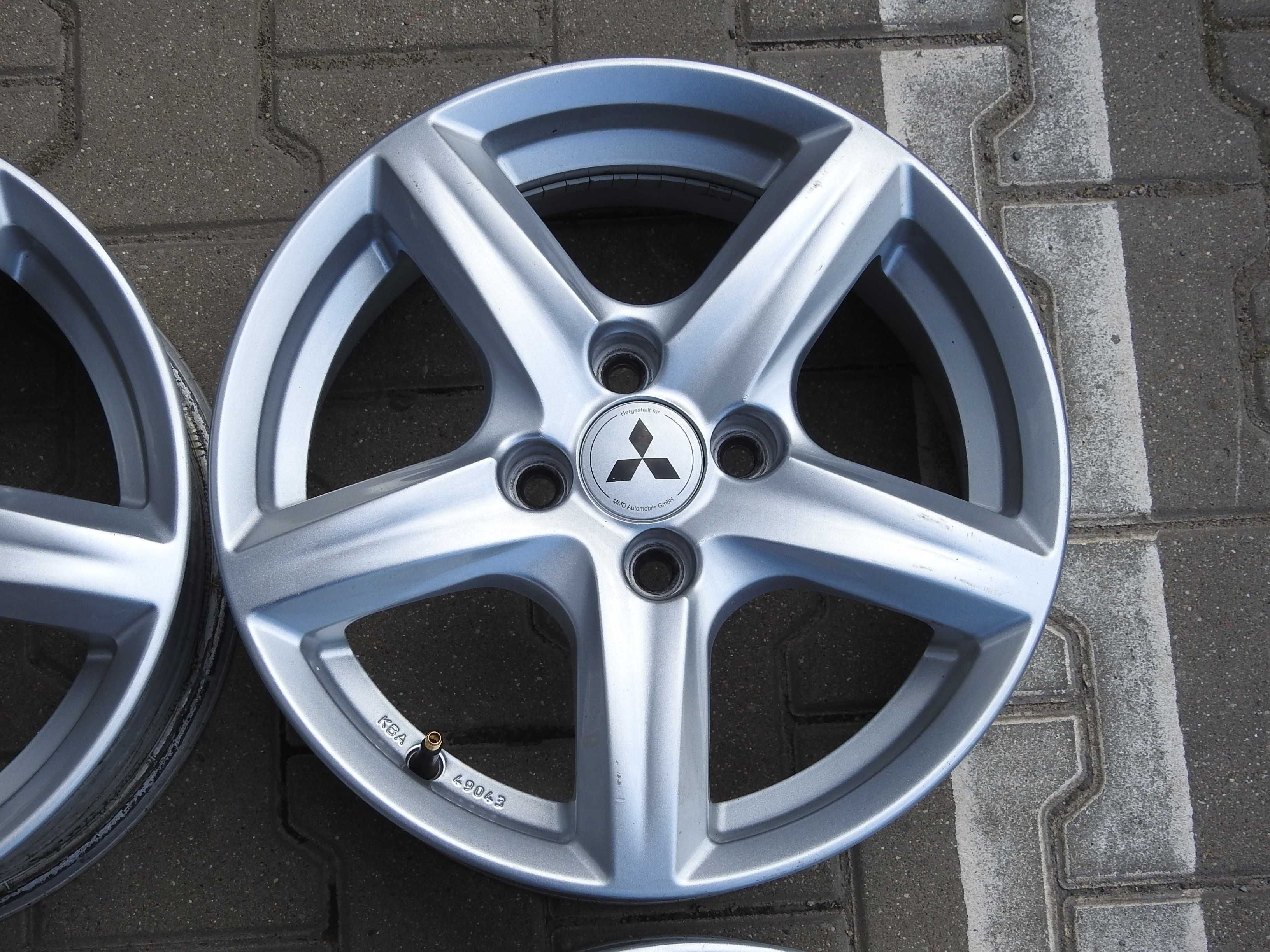 4x Alu 15'' 4x100 6J ET42 Piasta 56,1mm MITSUBISHI z czujnikami TPMS