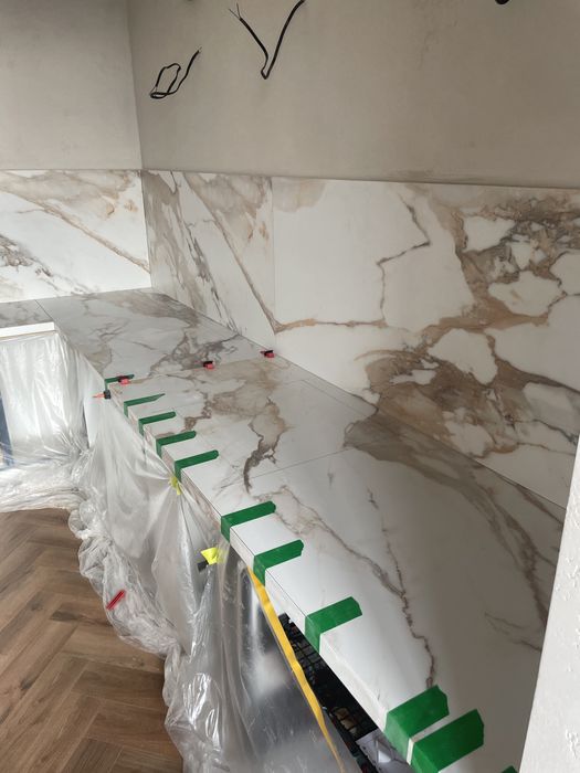 Облицювання плиткою та інші будівельні роботи