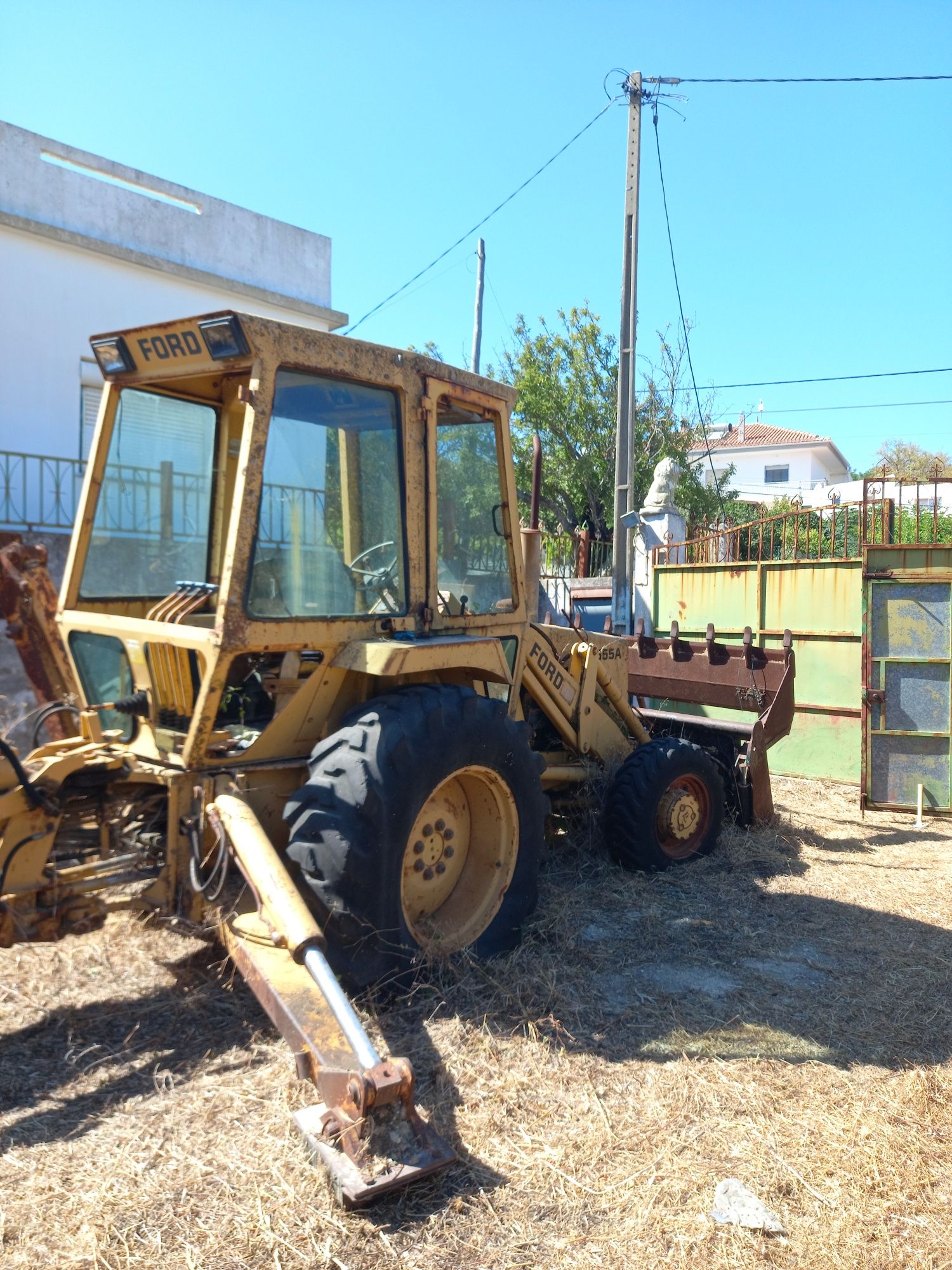Three Ford Tractores