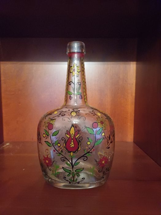 Garrafa de vidro antiga pintada à mão