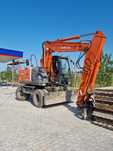 Koparka kołowa Hitachi ZW140X 2008 r. z łyżkami i widłami