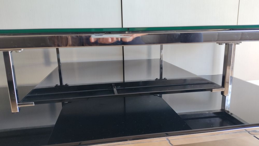 Mesa de vidro preto e cromado
