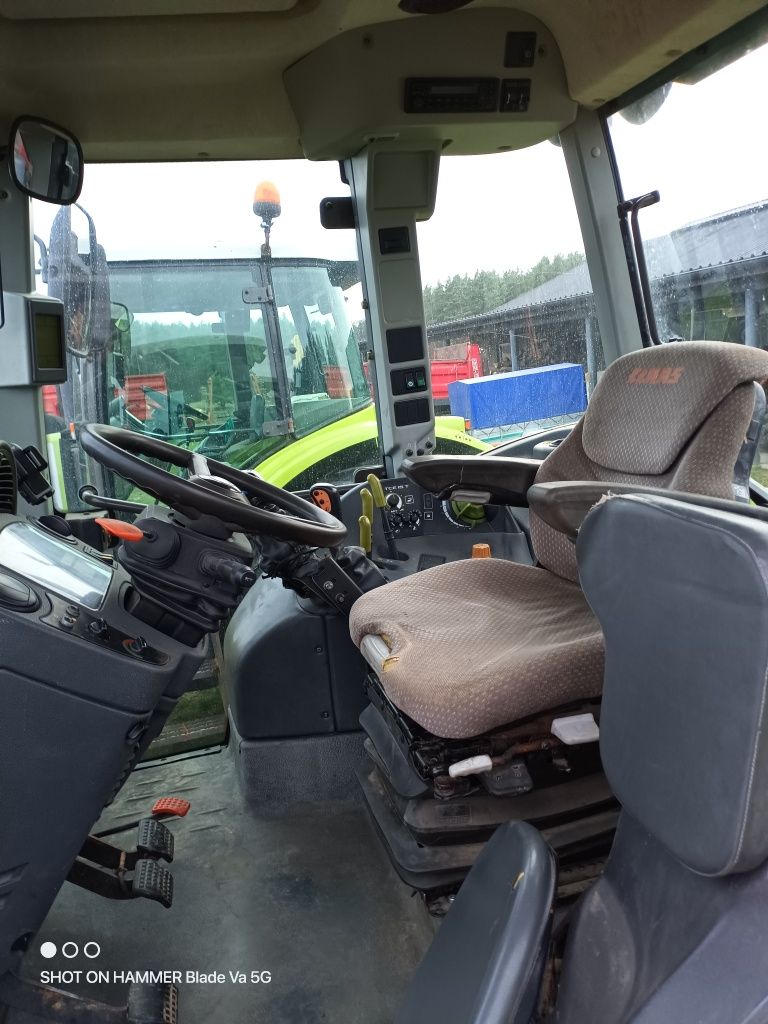 Claas Ares 557 z ładowaczem