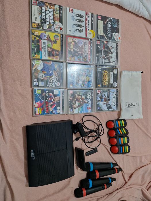 Playstation com jogos, comando buzz, microfones singstar
