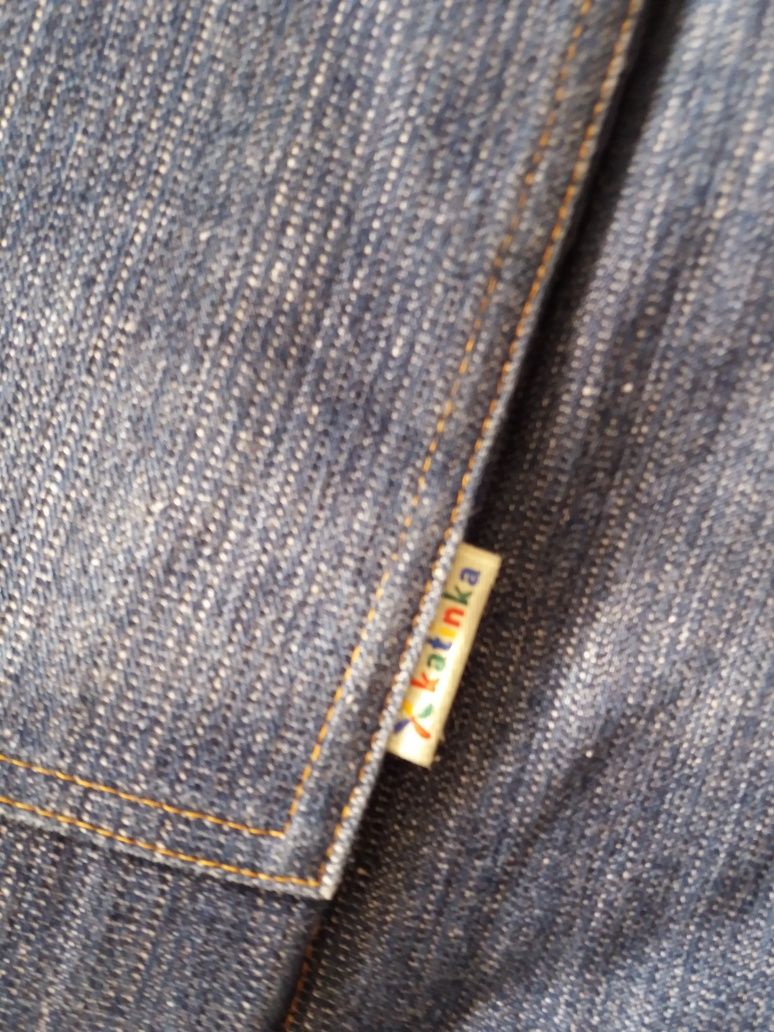 Слинг с кольцами из джинсовой ткани.