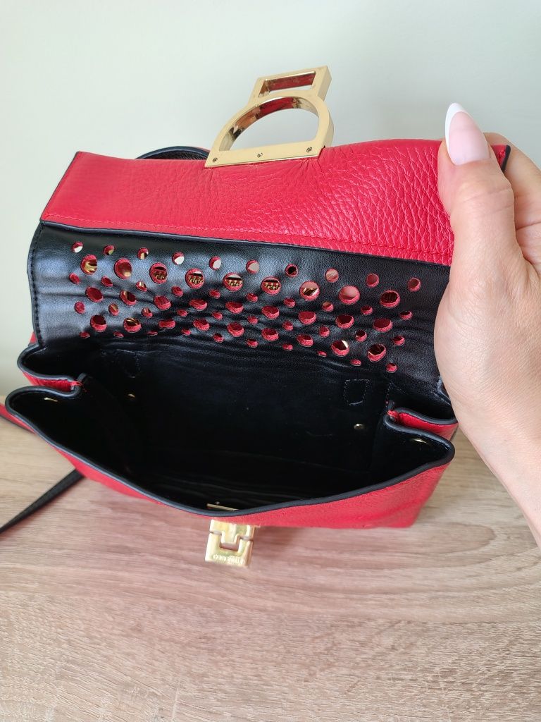 Шкіряна сумка Coccinelle 
Оригінал