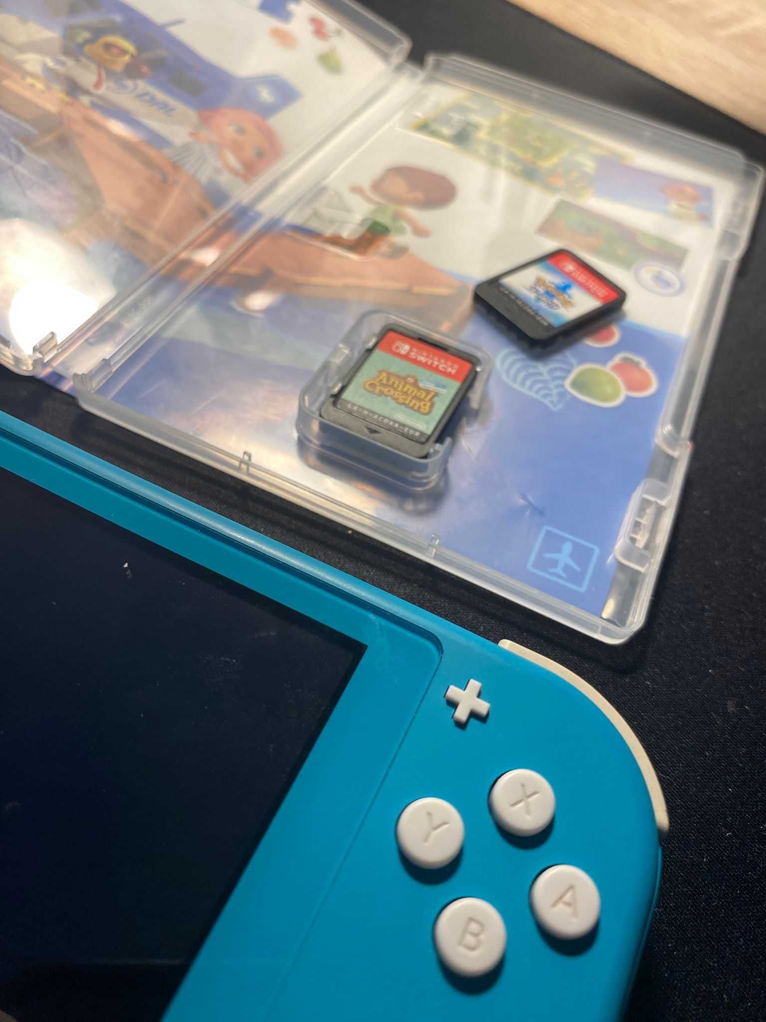 Nintendo Switch Lite + Jogos