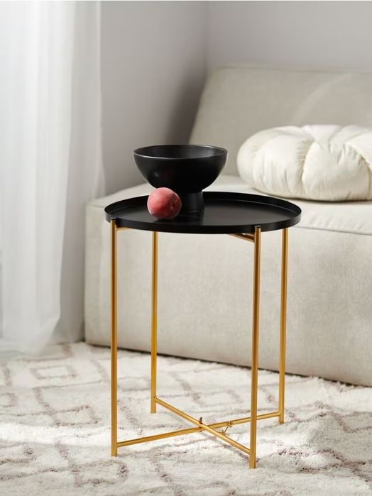 Stolik kawowy ze złotymi nogami Sinsay